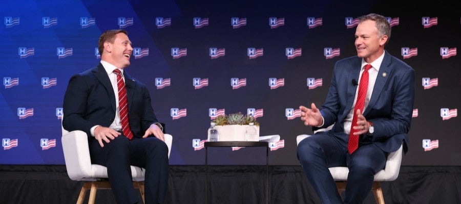 Moore interviewed on podium