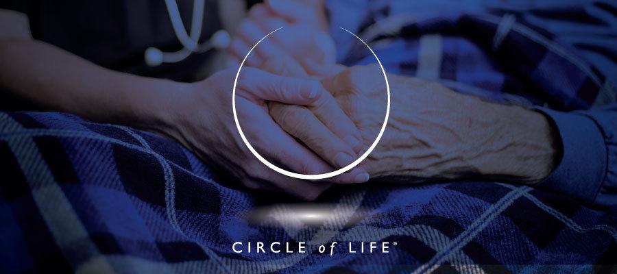 Circle of life award: image of elderly hands with the Circle of Life logo