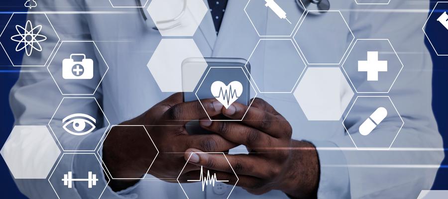 A doctor stands behind icons signifying health apps